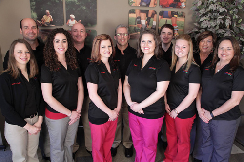 Dr. Chris Nunier and his chiropractic staff in New Albany 